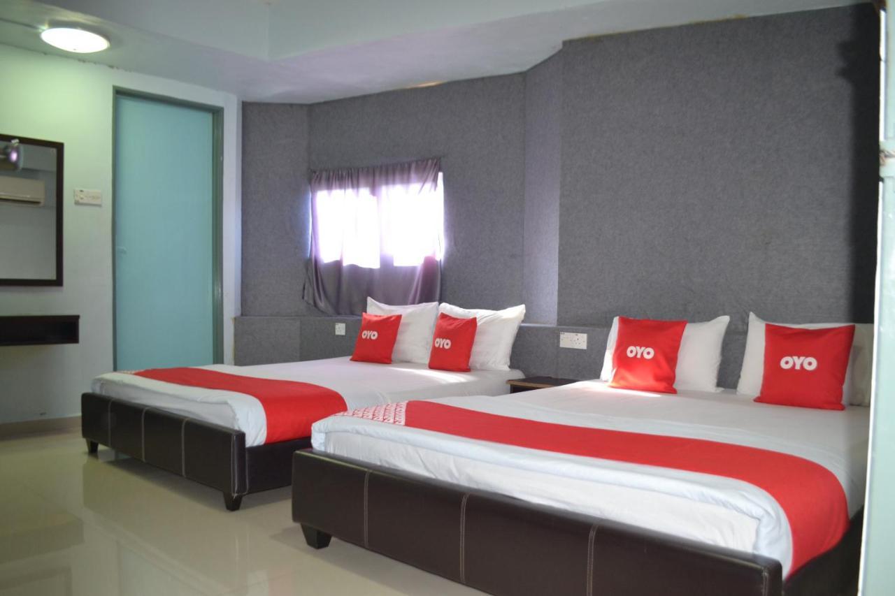 โอโย 89737 โฮเต็ล ติชัว Hotel Kampong Batu Tiga ภายนอก รูปภาพ