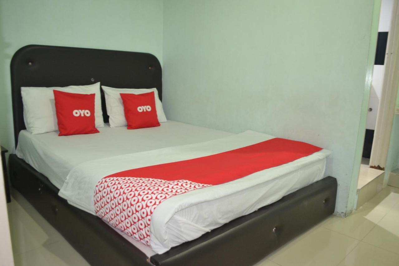 โอโย 89737 โฮเต็ล ติชัว Hotel Kampong Batu Tiga ภายนอก รูปภาพ